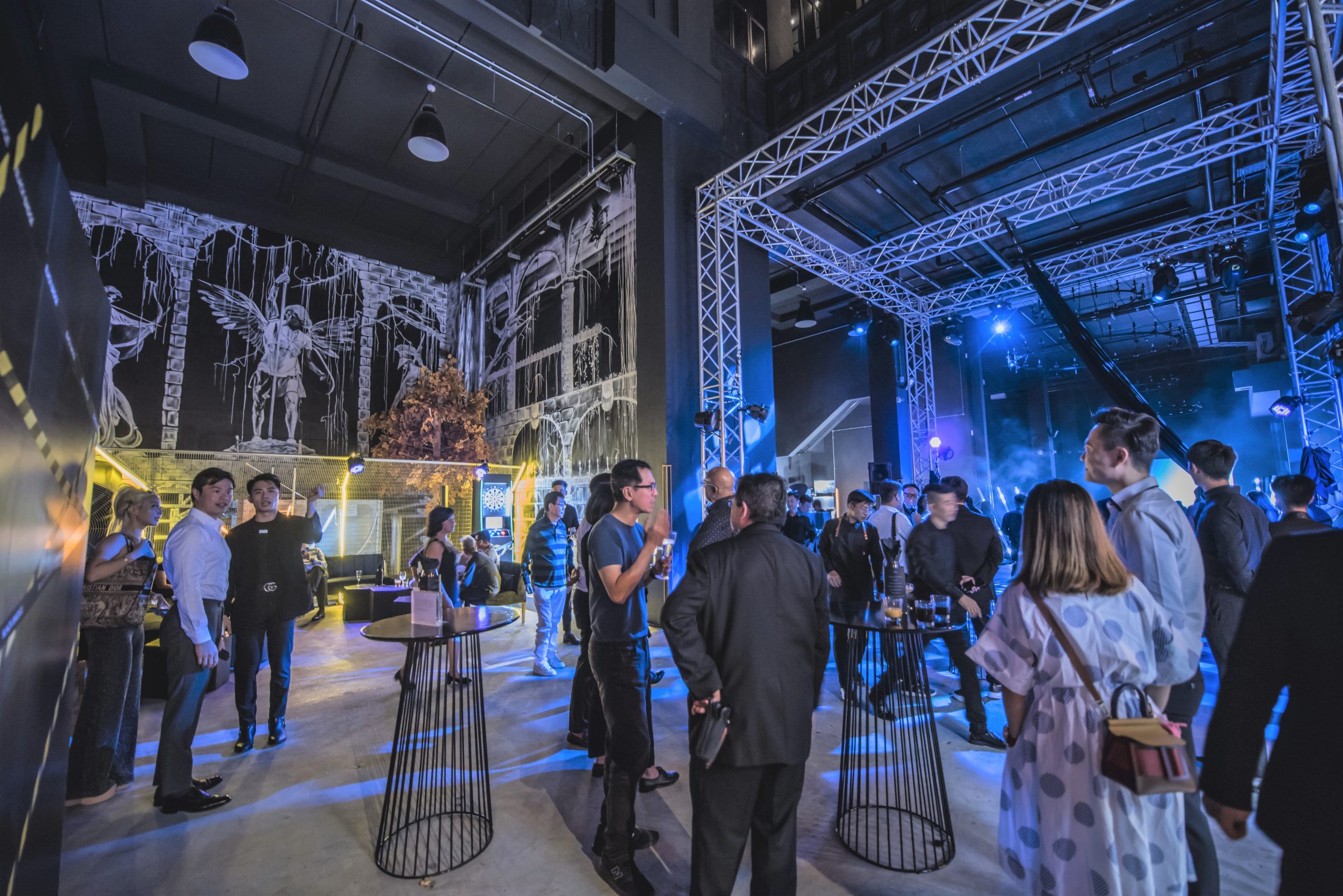 Invited guests of Rolls-Royce mingling with one another at The Mill, where the launch was held