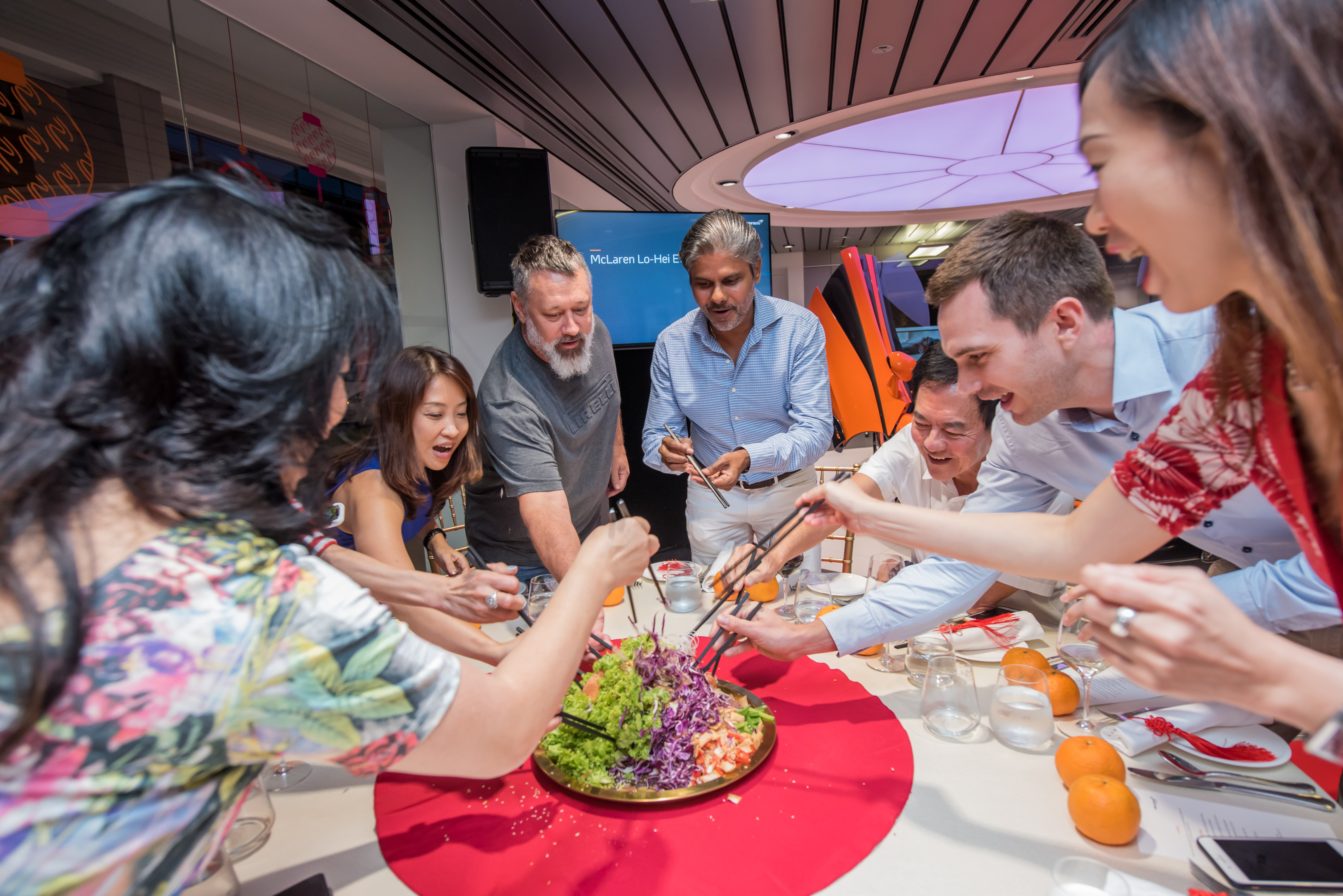McLaren owners and staff tossing to a year of good health and wealth